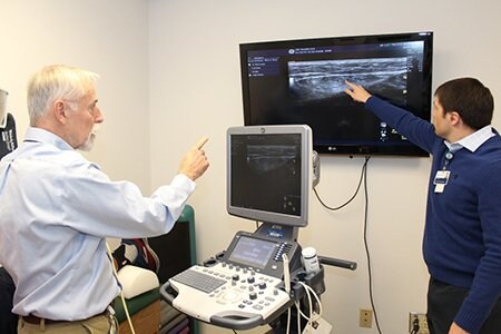 Dr. Fields teaching sports medicine fellow